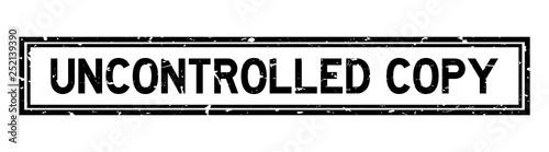 Grunge black uncontrolled copy word rubber seal stamp on white background
