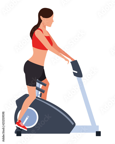woman working out on gym machine