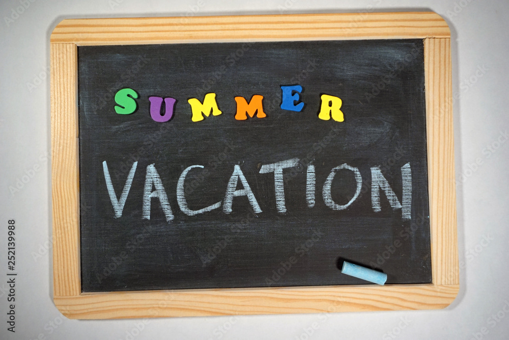 Summer vacation message on chalkboard Summer vacation message on chalkboard