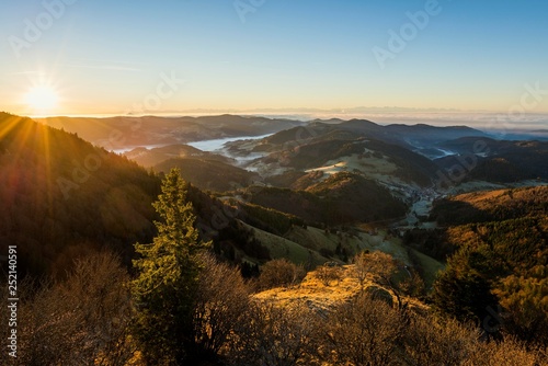 View from Belchen into Wiesental valley, morning mood with fog, Black Forest, Baden-Wurttemberg, Germany, Europe photo