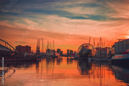 Panoramic view of old port and Biosphere (Glass sphere) in Genoa at sunset, Liguria, Italy