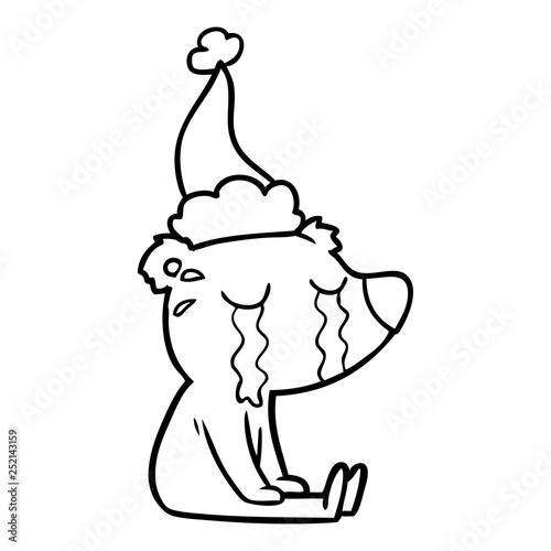 line drawing of a crying sitting polar bear wearing santa hat