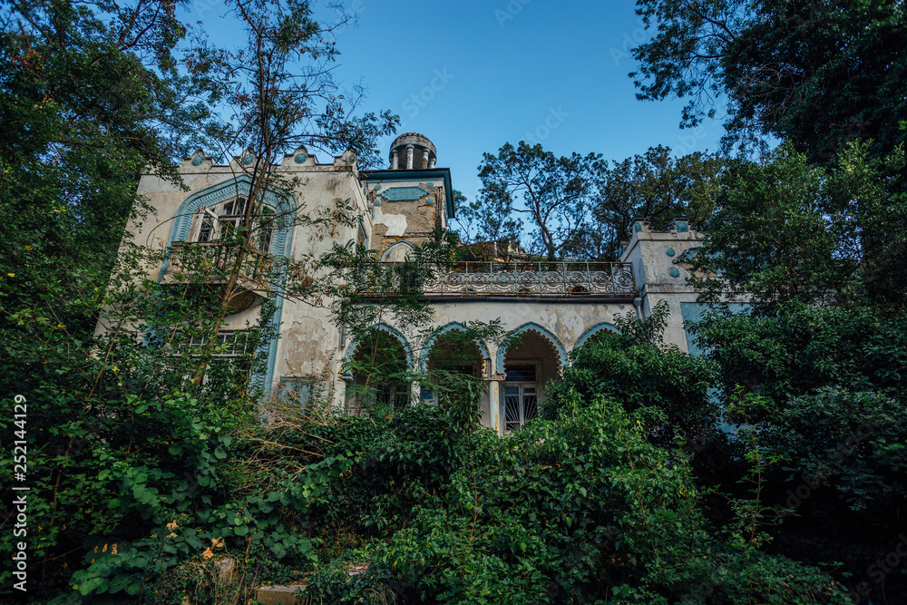 Abandoned and overgrown mansion in oriental style. Concept of Tale 1001 Arabian Nights. Villa Dream, Crimea
