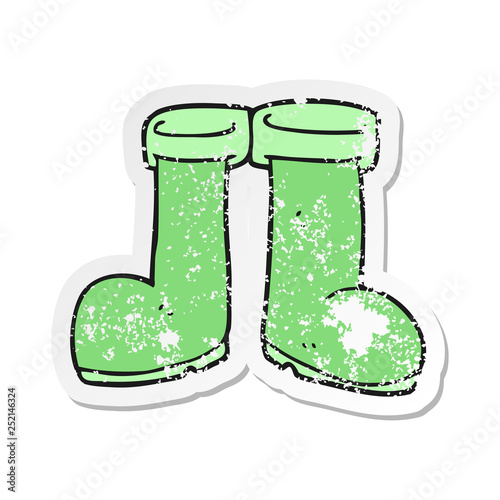 retro distressed sticker of a cartoon wellington boots