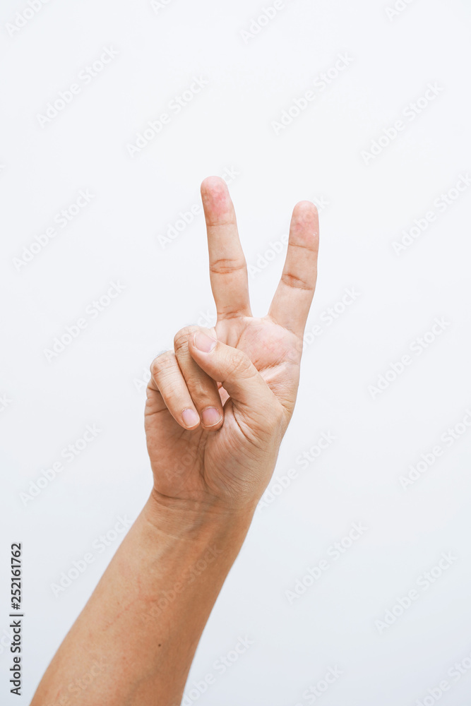 Man hand showing two fingers on white background. Man hand showing two fingers on white background.