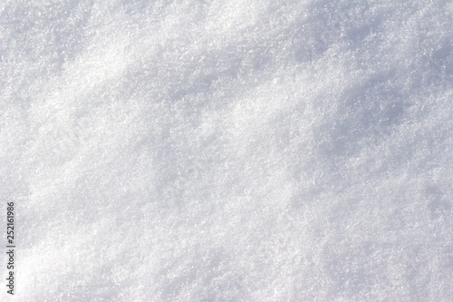 Macro background of fresh white snow texture