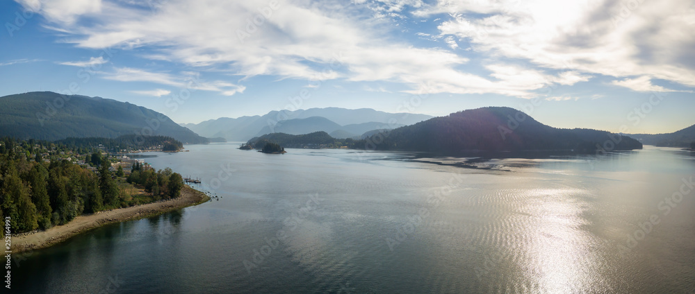 Aerial Panoramic view of a beautiful Ocean Inlet in the Modern City during a sunny summer day. Taken in Deep Cove, North Vancouver, BC, Canada.