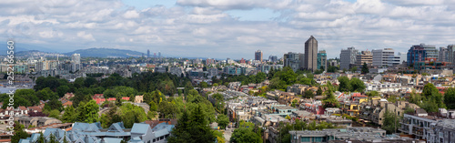 Aerial Panoramic view of the modern city during a cloudy summer day. Taken in Vancouver  British Columbia  Canada.
