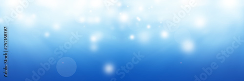 white circle on blue blur abstract background. bokeh Christmas blurred beautiful shiny Christmas lights © ooddysmile
