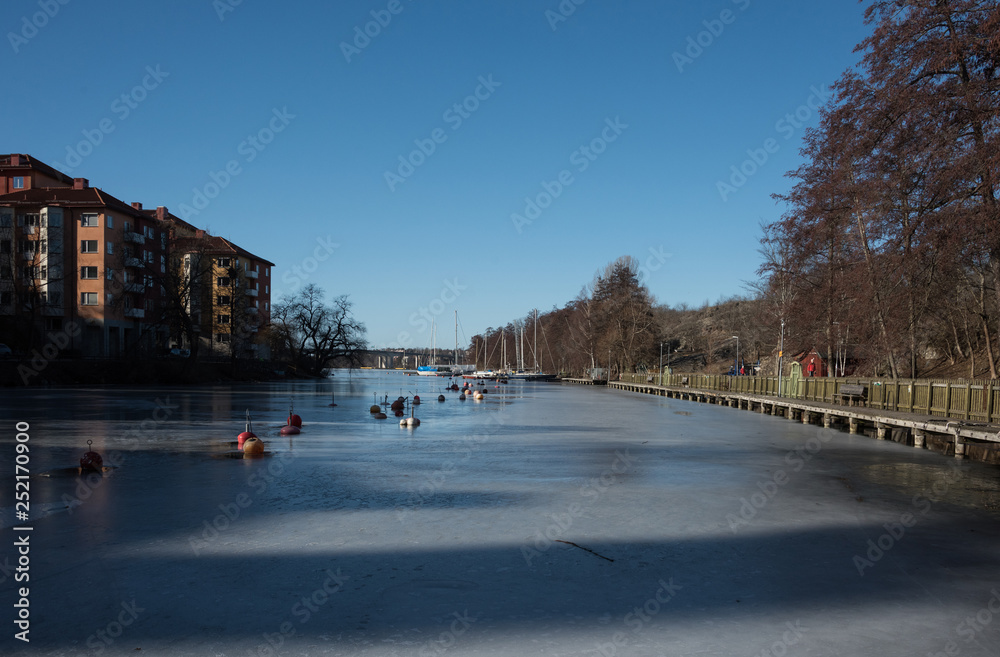 Spring view at the channel by the Långholmen island in Stockholm Spring view at the channel by the Långholmen island in Stockholm
