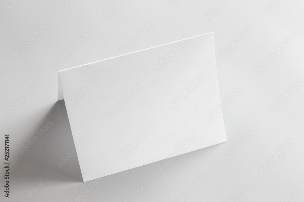 Blank portrait mock-up paper. brochure magazine isolated on gray, changeable background / white paper isolated on gray Blank portrait mock-up paper. brochure magazine isolated on gray, changeable background / white paper isolated on gray