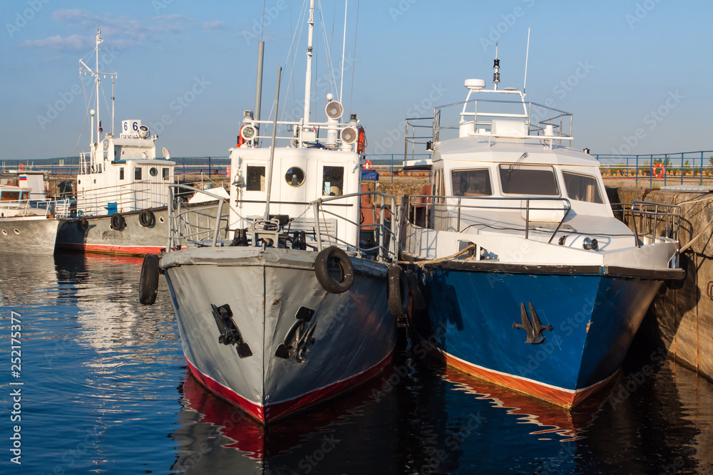Many boats at the pier.