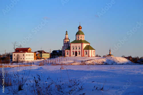 Photo of a bright beautiful old Russian retro temple in Suzdal