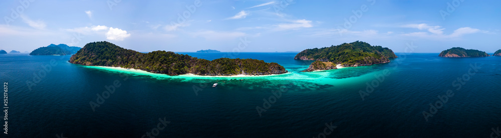 Aerial view of beautiful white sand beach and snorkel point at Cockburn island in Andaman sea near Ranong Thailand, Myanmar (Photo from Drone)