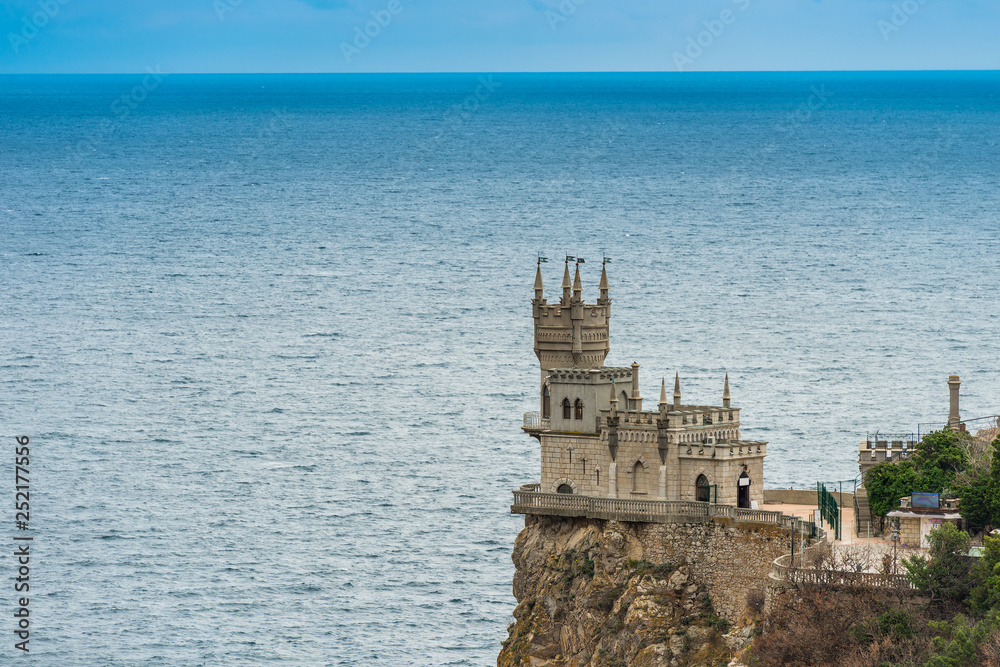 Swallow's Nest on the edge of a cliff against the background of the sea, view of the landmark of the Crimea - Russia