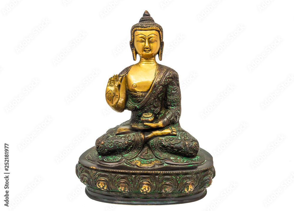 Statue of Buddha sitting in meditation with one hand blessing on white background