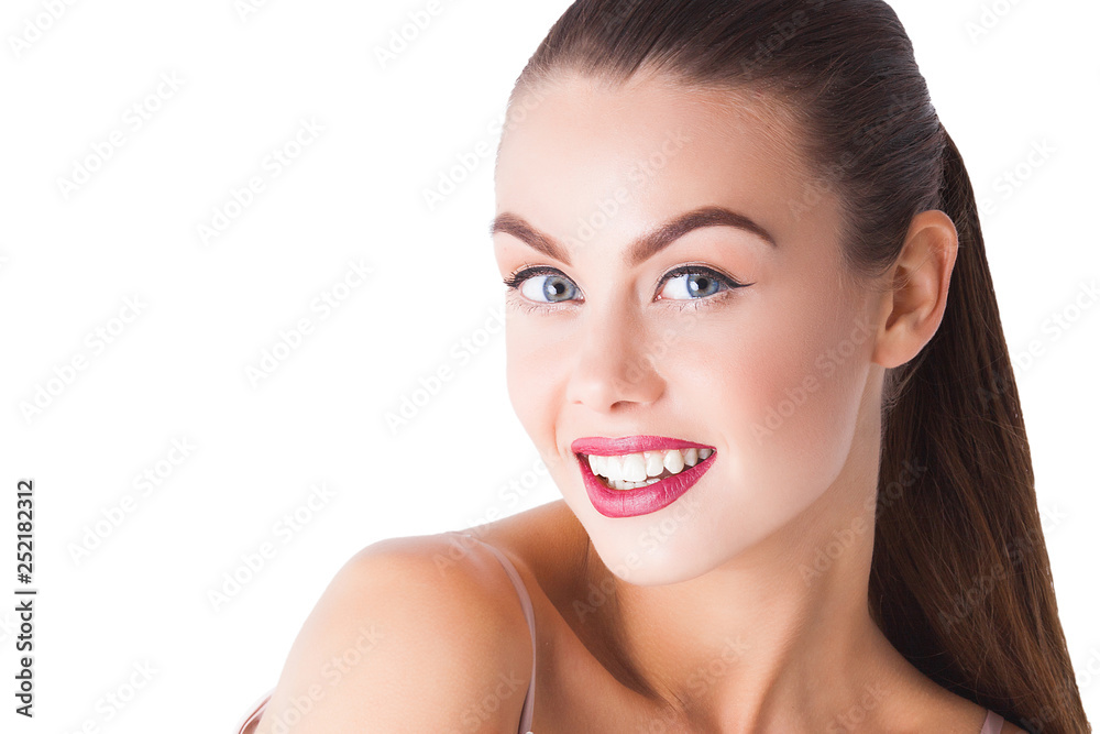 Obraz premium Woman closeup isolated on white. Young beautiful girl portrait. Female smiling. Cheerful model facial portrait.