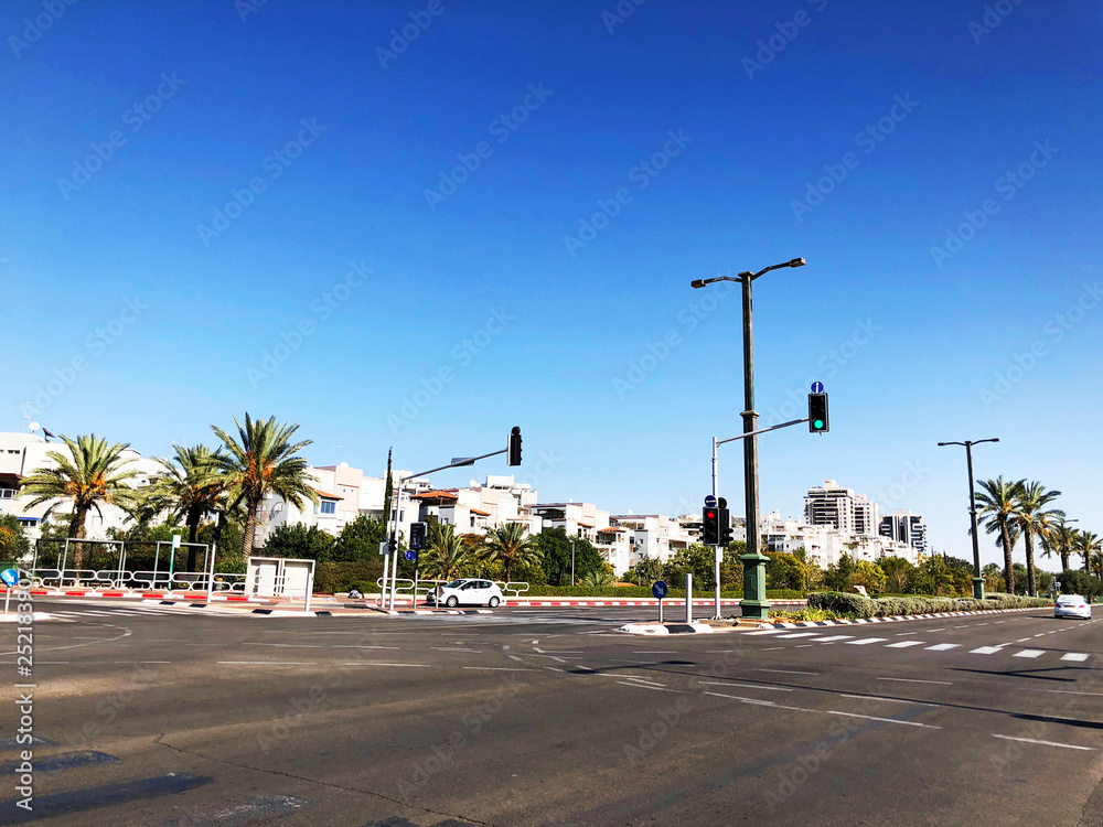 RISHON LE ZION, ISRAEL -December 4, 2018:  The street and private houses  in Rishon Le Zion, Israel