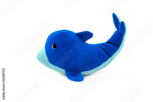 Stuffed blue dolphin doll isolated on white background.