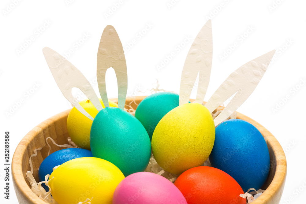 easter eggs with bunny ears in bowl isolated easter eggs with bunny ears in bowl isolated