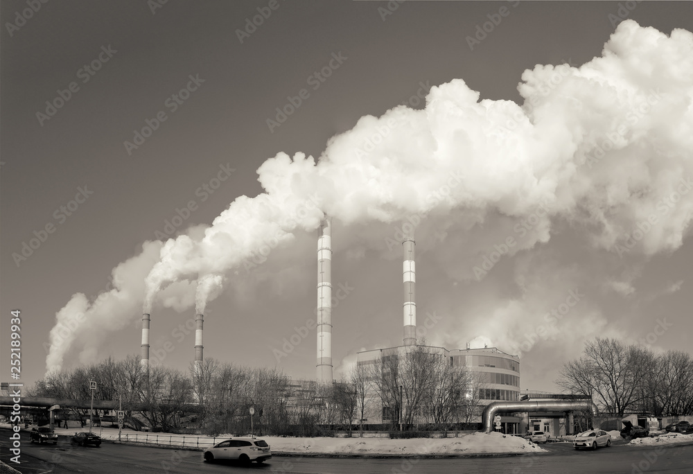 Obraz premium Power plant, smoke from the chimney. Toned image