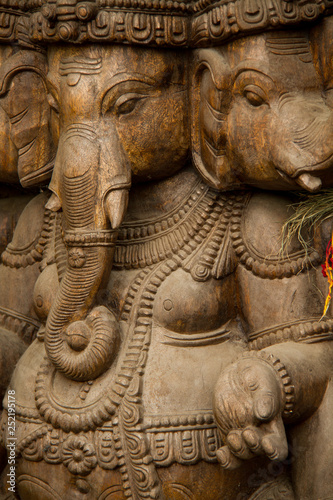 Fragment of wooden Hindu elephant head god Ganesh