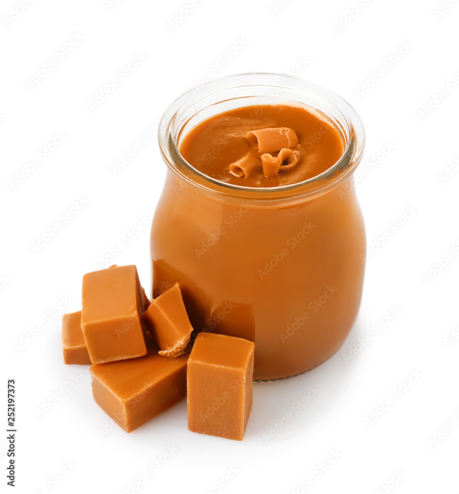Jar with sweet liquid caramel on white background Jar with sweet liquid caramel on white background