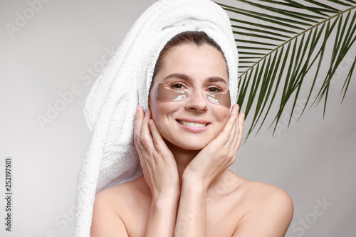 Woman with under-eye patche...