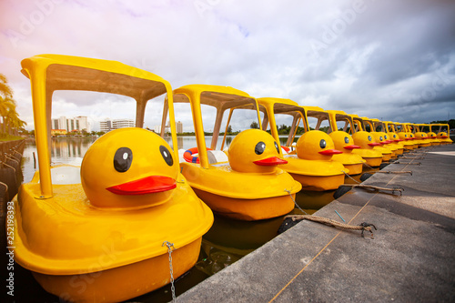 Yellow duck Pedal boat  in park.