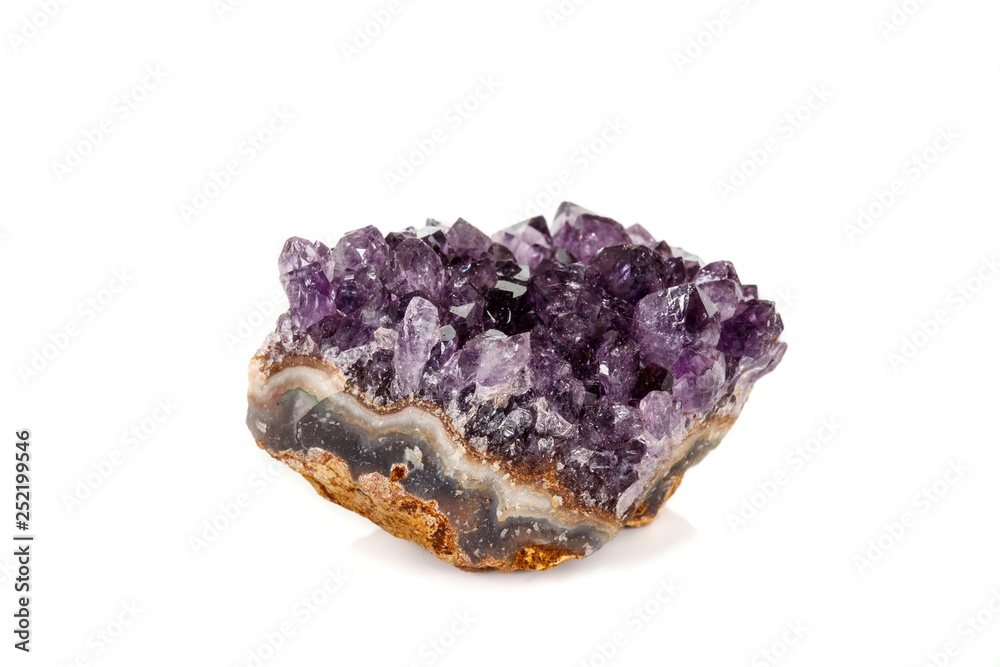 Amethyst Crystal Druse macro mineral on white background Amethyst Crystal Druse macro mineral on white background