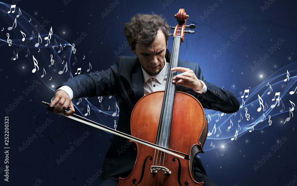 Fototapeta premium Lonely musical composer with cello and sparkling musical notes around