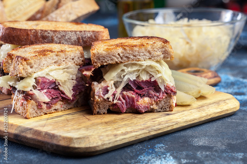 Reuben Sandwich with corned beef, cheese and sauerkraut photo