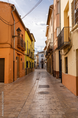 Empty old town street view in Canals, Spain.