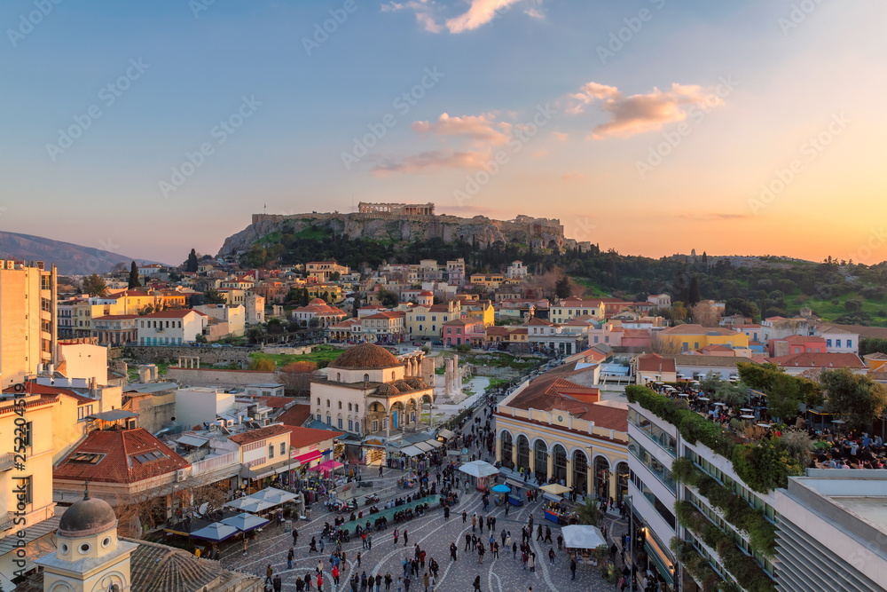 The old town of Athens and the Parthenon Temple of the Acropolis at sunset.