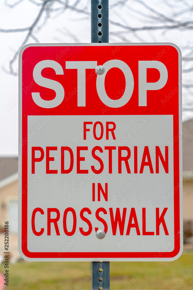 Stop For Pedestrian In Crosswalk road sign Stop For Pedestrian In Crosswalk road sign
