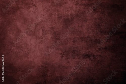 Reddish grungy distressed canvas bacground