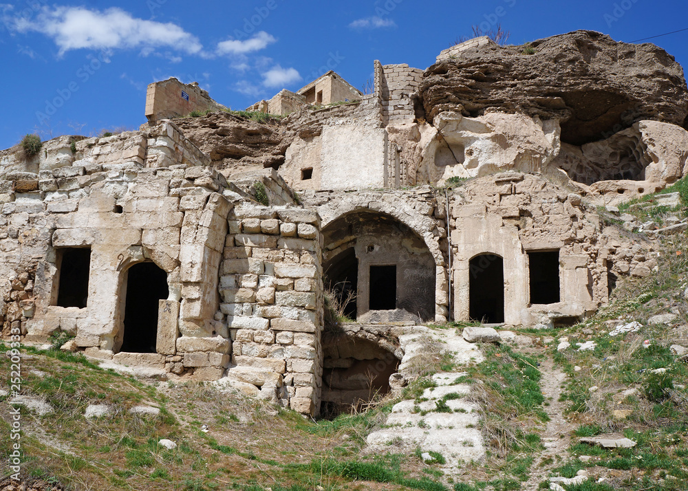 Ruins of an abandoned old cave houses with arches at Avanos. Turkey, Cappadocia
