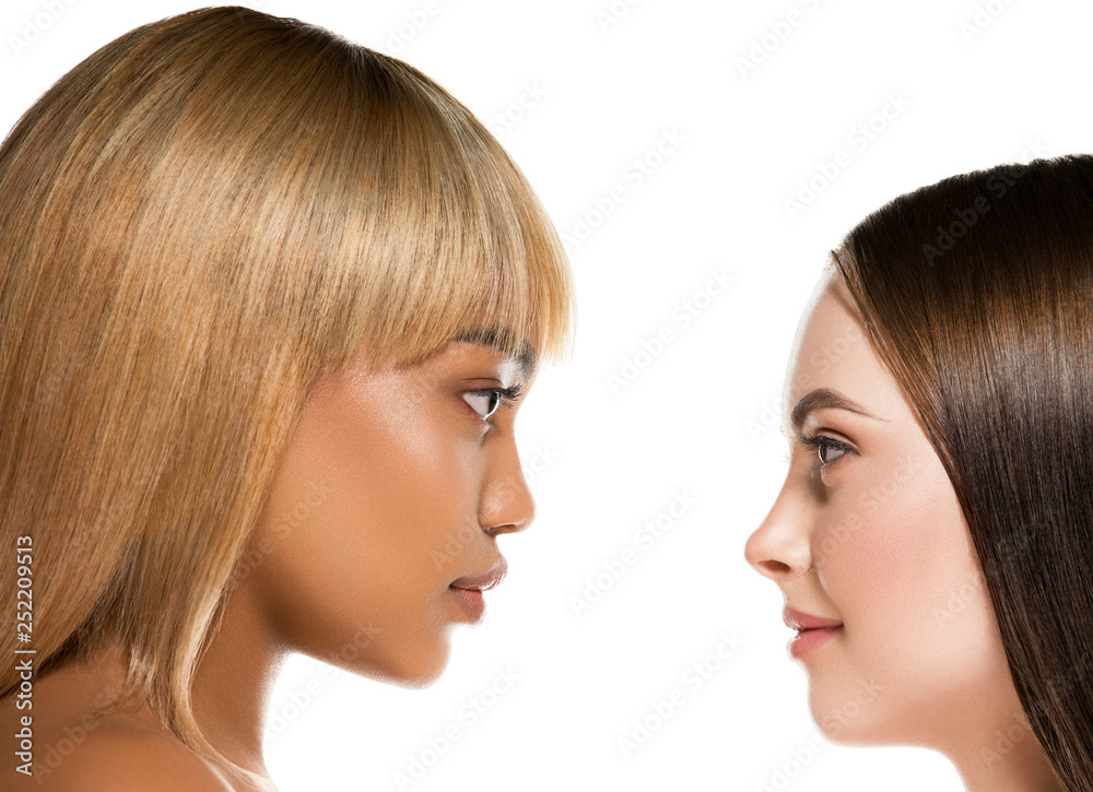 Women portrait mix races black skin and white skin female beauty Women portrait mix races black skin and white skin female beauty