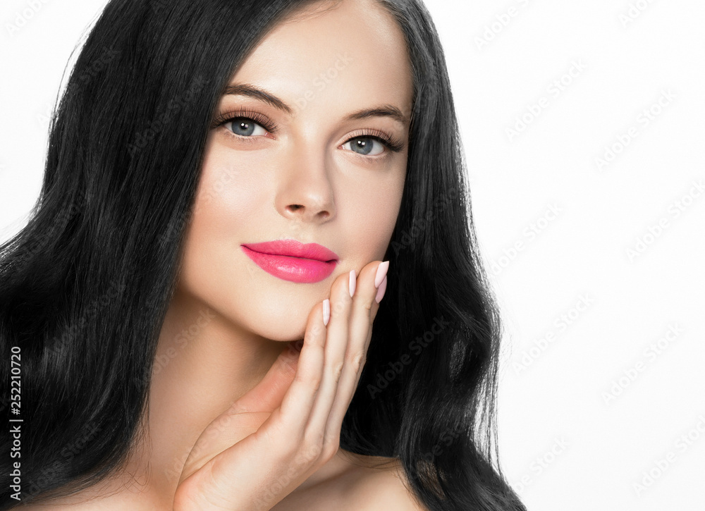 Brunette woman with long black hair and pink lipstick lips, female with beautiful eyes with lash extensions Brunette woman with long black hair and pink lipstick lips, female with beautiful eyes with lash extensions