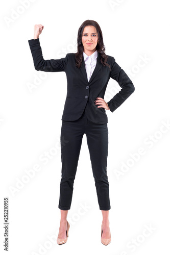 Strong independent business woman showing arm flexing bicep muscles. Full body isolated on white background. 