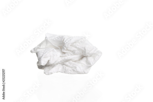 Screwed paper tissue isolated on white background