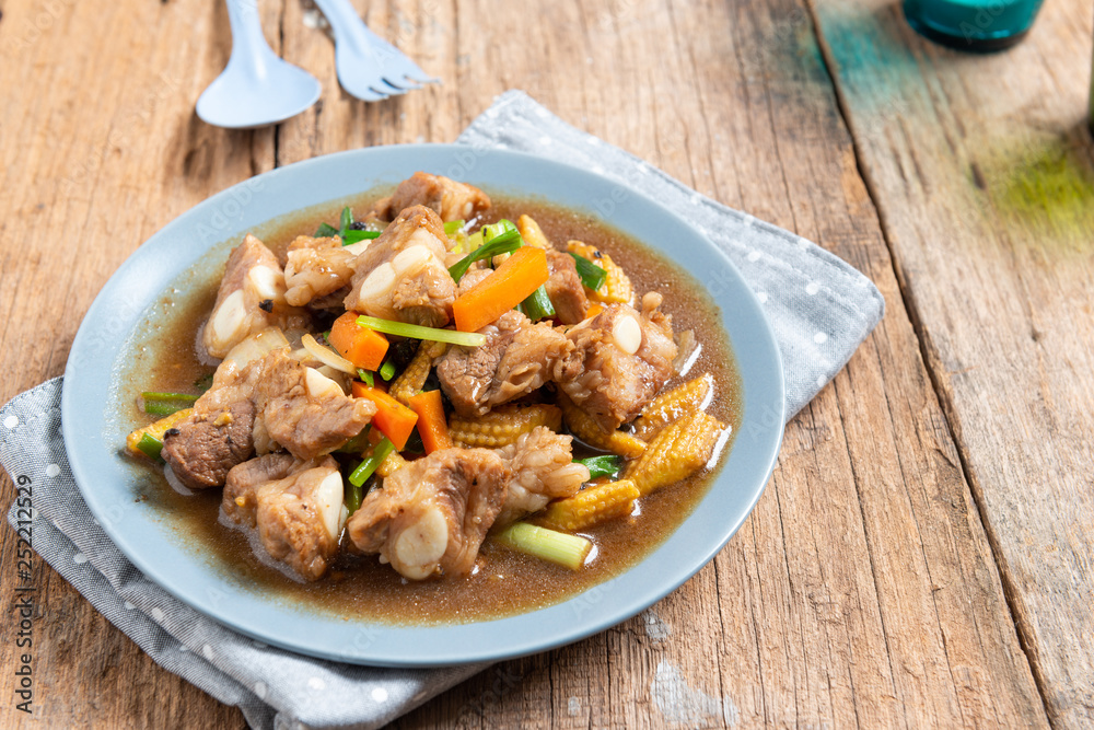 Pork spare rib stir fried with soy sauce and black pepper Pork spare rib stir fried with soy sauce and black pepper