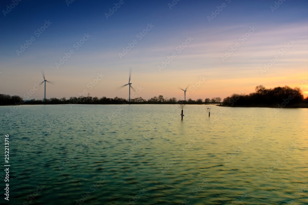 Sun Set, Lake and Turbines