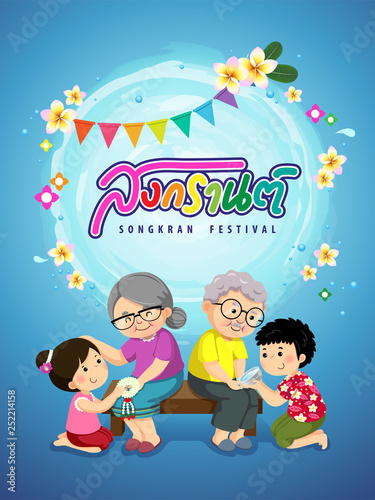 Kids giving jasmine garland and pouring scented water onto elders’hands and asking for blessing. Songkran Thai festival concept.
