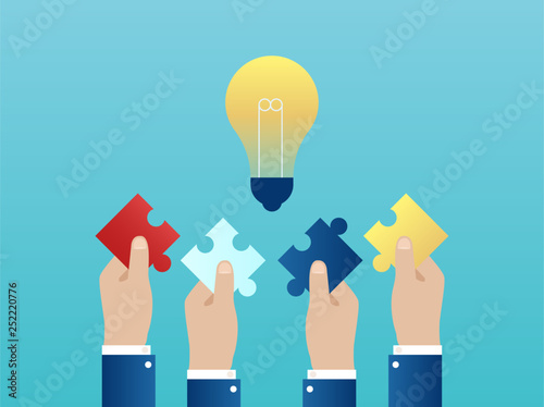 Vector of four hands together reaching out with puzzle pieces having a successful idea