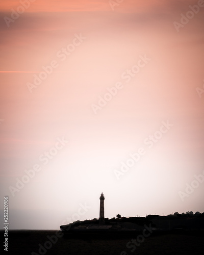 Saint Georges les Didonne lighthouse in the sunset in France photo