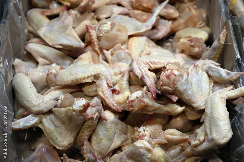 Preparation of chicken wings on chopping board finishing.turkey - Preparation of chicken wings on chopping board finishing.turkey -