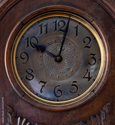 close-up of the dial of the old clock
