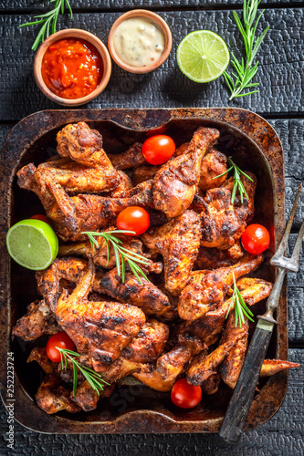 Grilled chicken leg with rosemary and spices