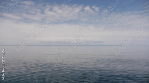 Wallpaper Mural great panorama of clean and blue surface and calm waves of a huge lake Torontodigital.ca